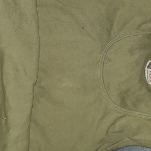 Green sleeveless shirt